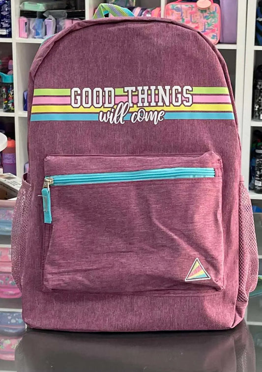 Clio Style Backpack - Clio backpack 43x30x13 in pink with front pocket and 'Good Things Will Come' text. Ideal for school or casual use.