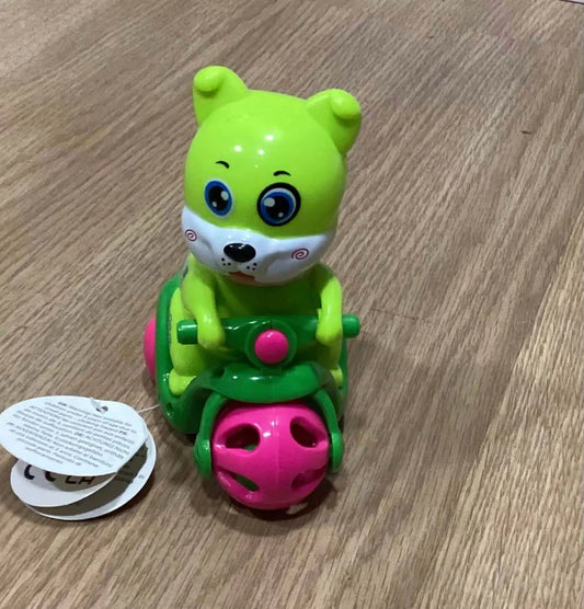Cartoon Animal Bike Toy with green bear riding a pink and green friction-powered motorcycle. Durable design for kids' playtime fun.