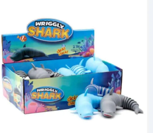 Wriggly Shark fidget toys in shark and dolphin designs displayed in a colorful box. Sensory toy for kids to relieve stress and improve focus.
