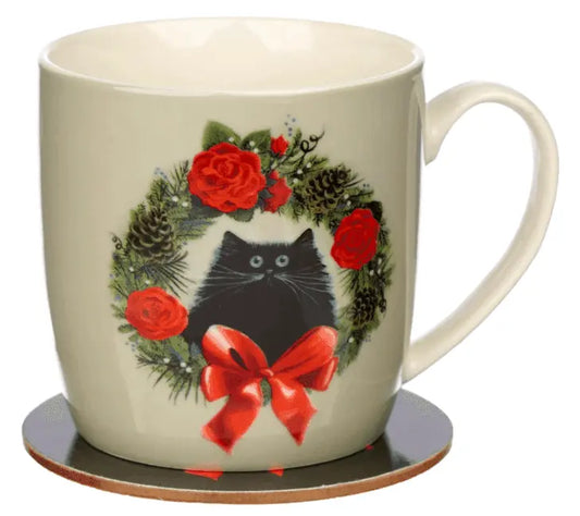 Kim Haskins Christmas wreath cat porcelain mug with cork coaster, decorated with festive flowers and a black cat.