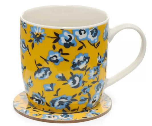 Peony Mug and Coaster Set featuring a vibrant yellow porcelain mug with blue floral design and matching round coaster, ideal for gifting.