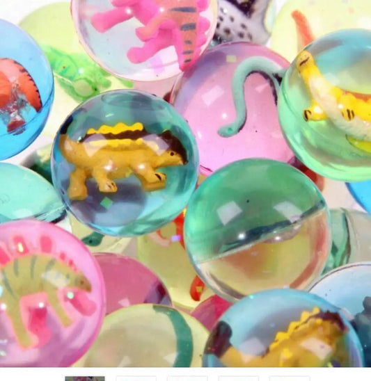 3D Dinosaur Toy Ball featuring colorful translucent balls with miniature dinosaur figures inside. Ideal for interactive play and dinosaur-themed fun.