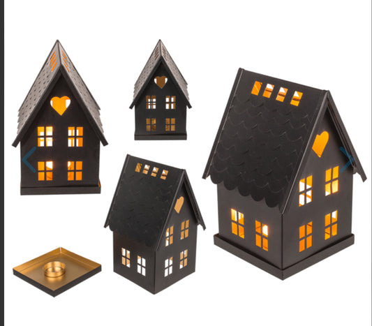 Black metal decoration house for tealights.